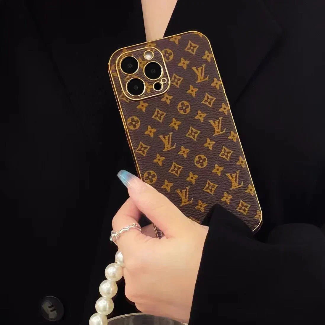 Louis Vuitton-inspired brown monogram iPhone case with emblem