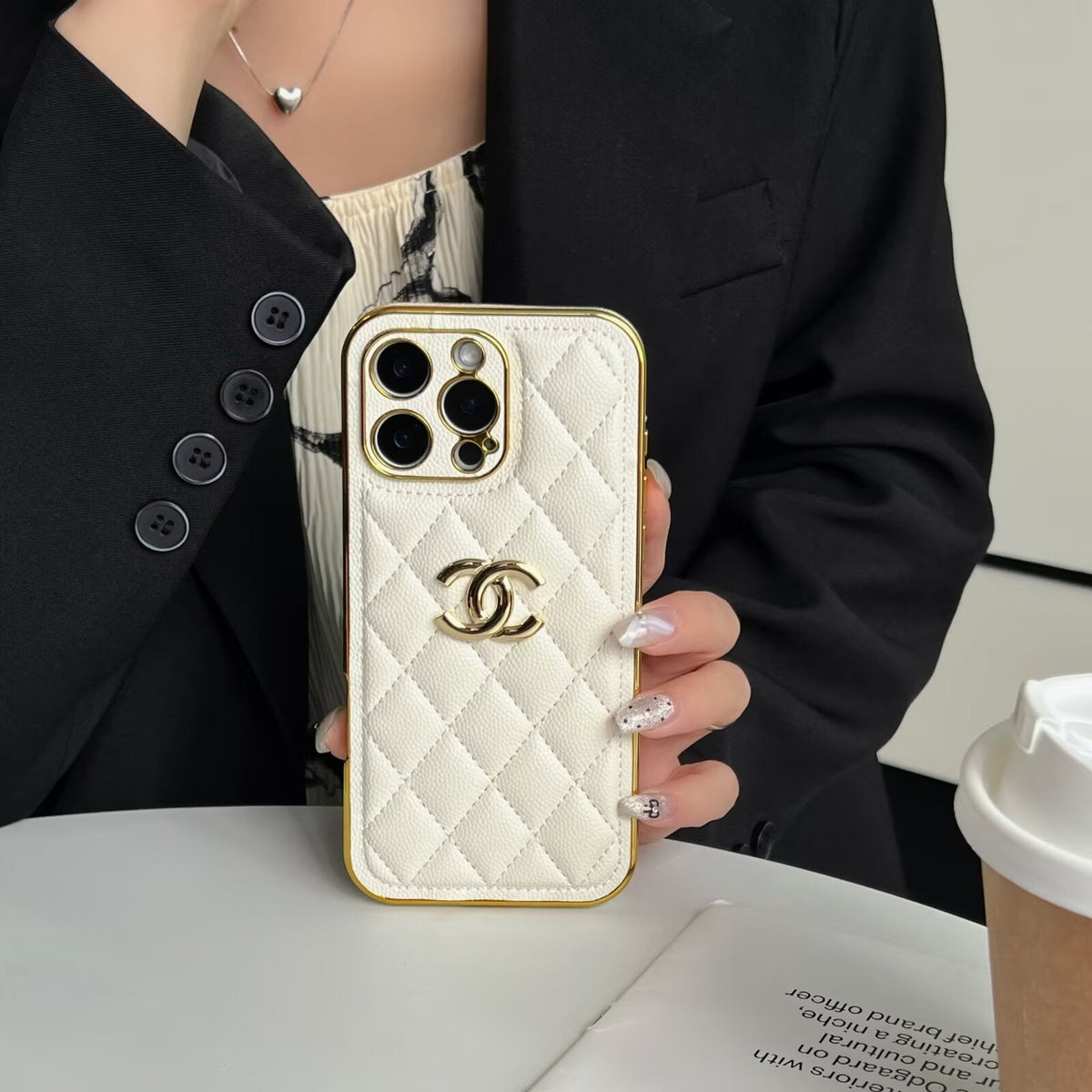 Chanel-inspired quilted iPhone case with gold-tone detail
