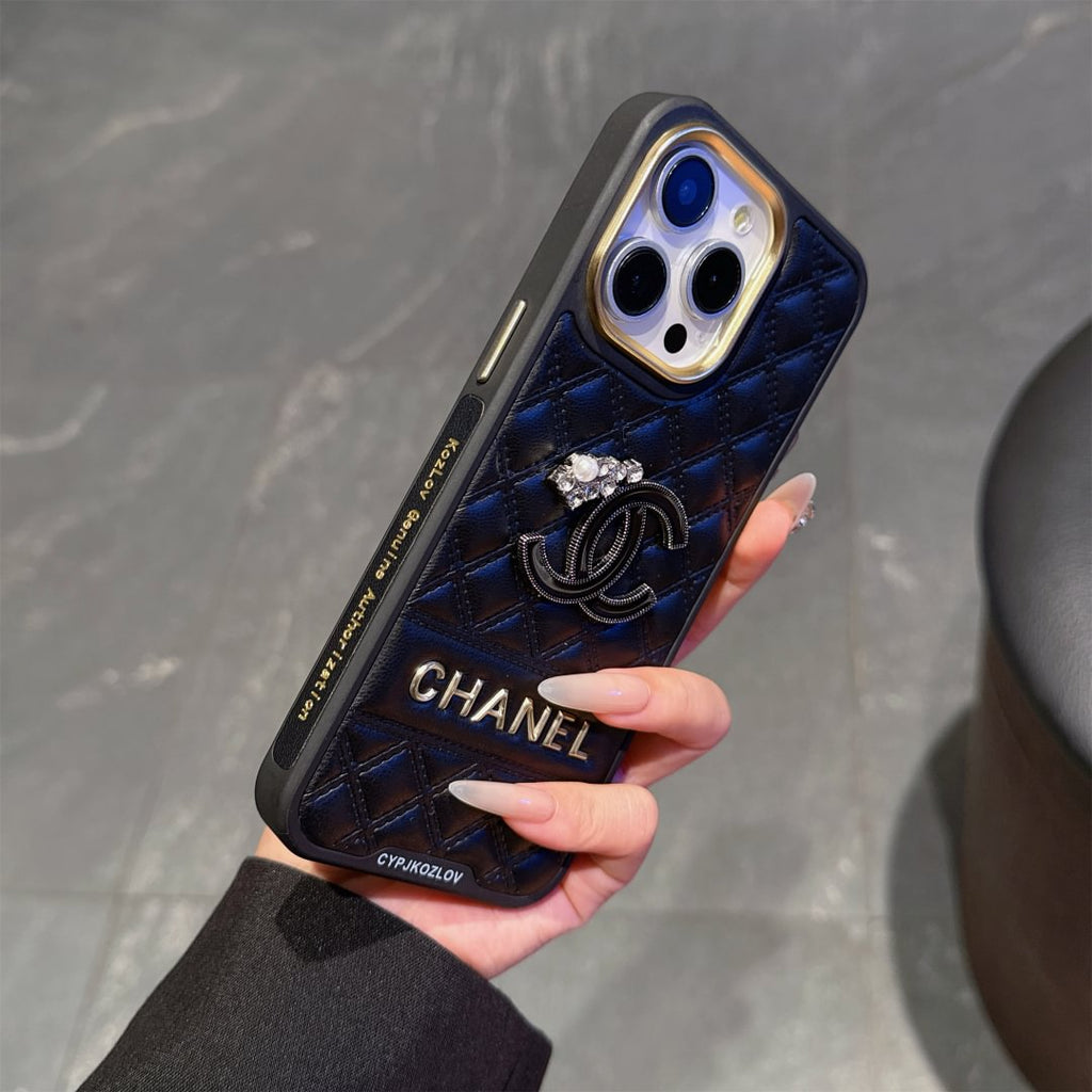 Chanel-inspired quilted iPhone case with sparkling emblem