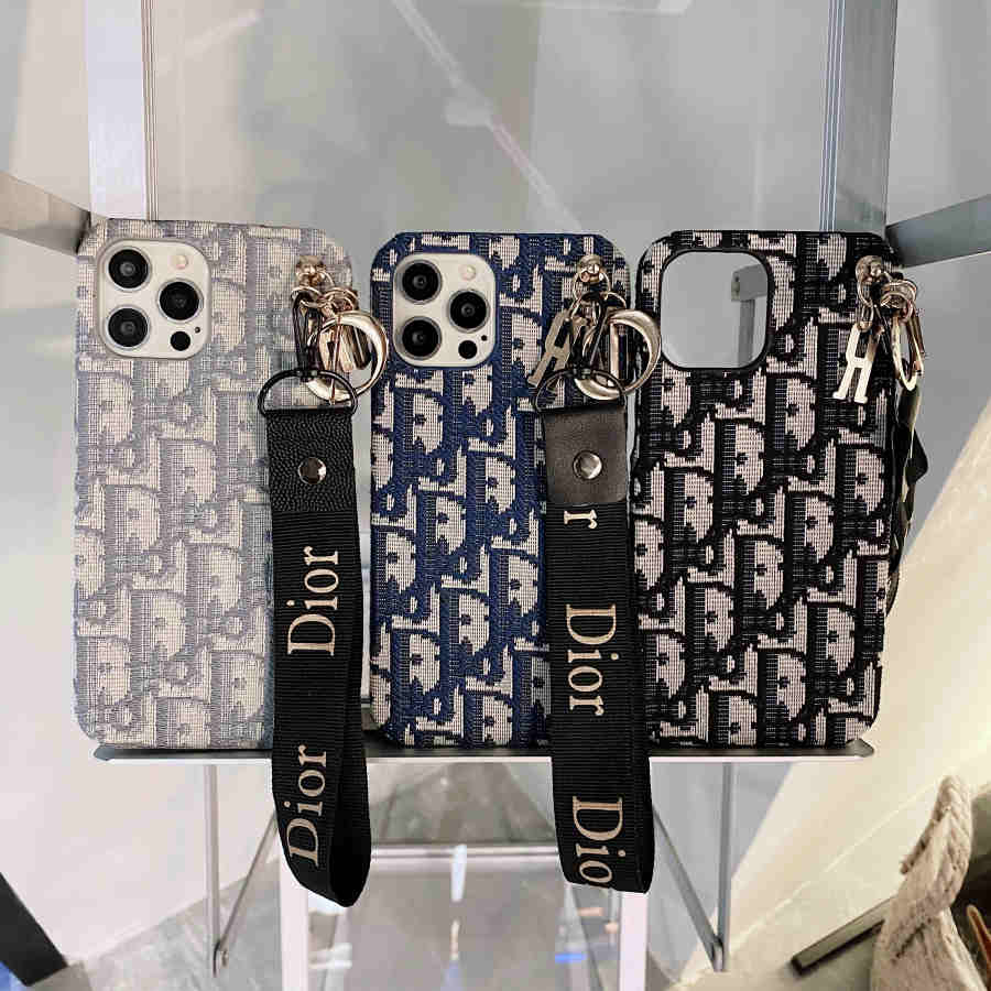 Dior-inspired all-over pattern phone case with hand strap