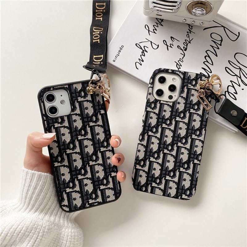 Dior-inspired all-over pattern phone case with hand strap