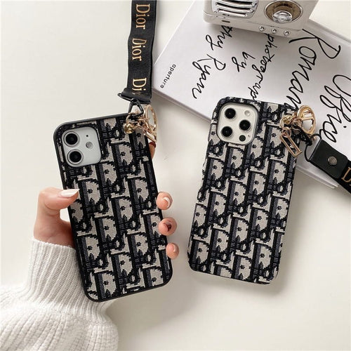 Dior-inspired all-over pattern phone case with hand strap