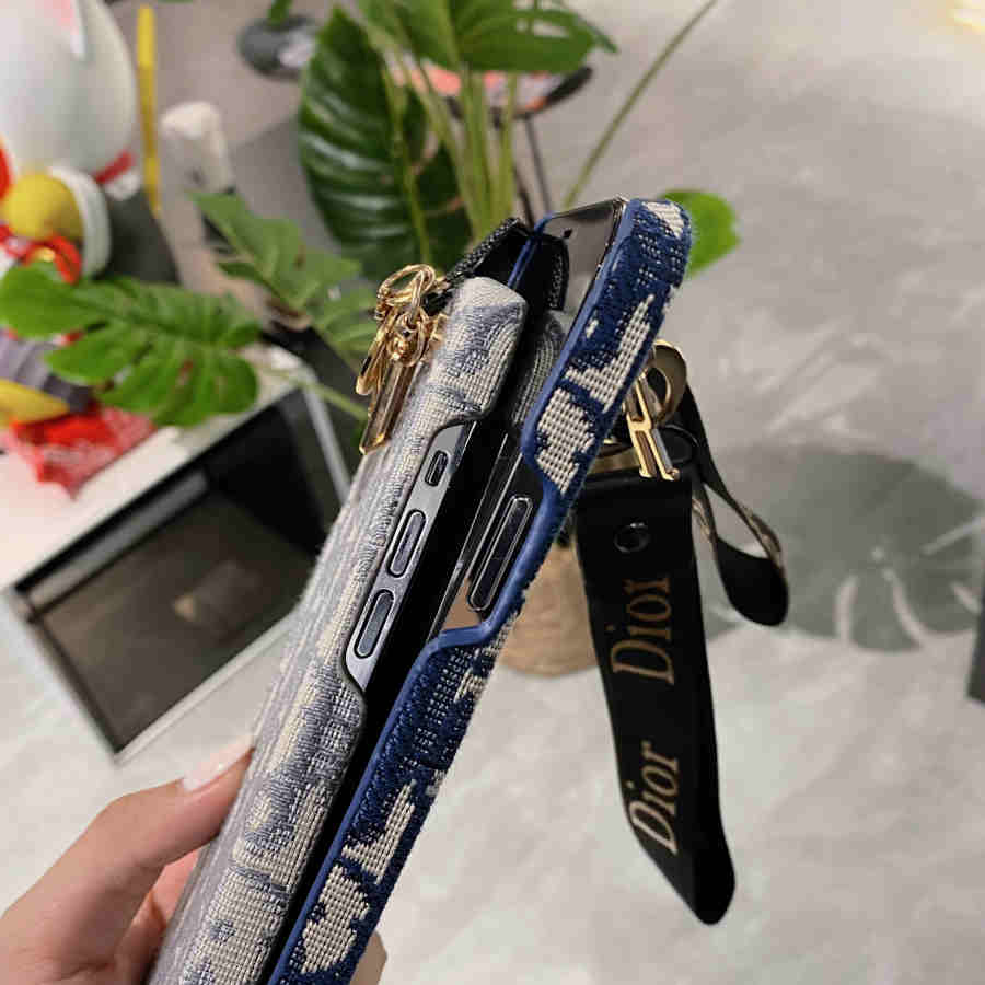 Dior-inspired all-over pattern phone case with hand strap