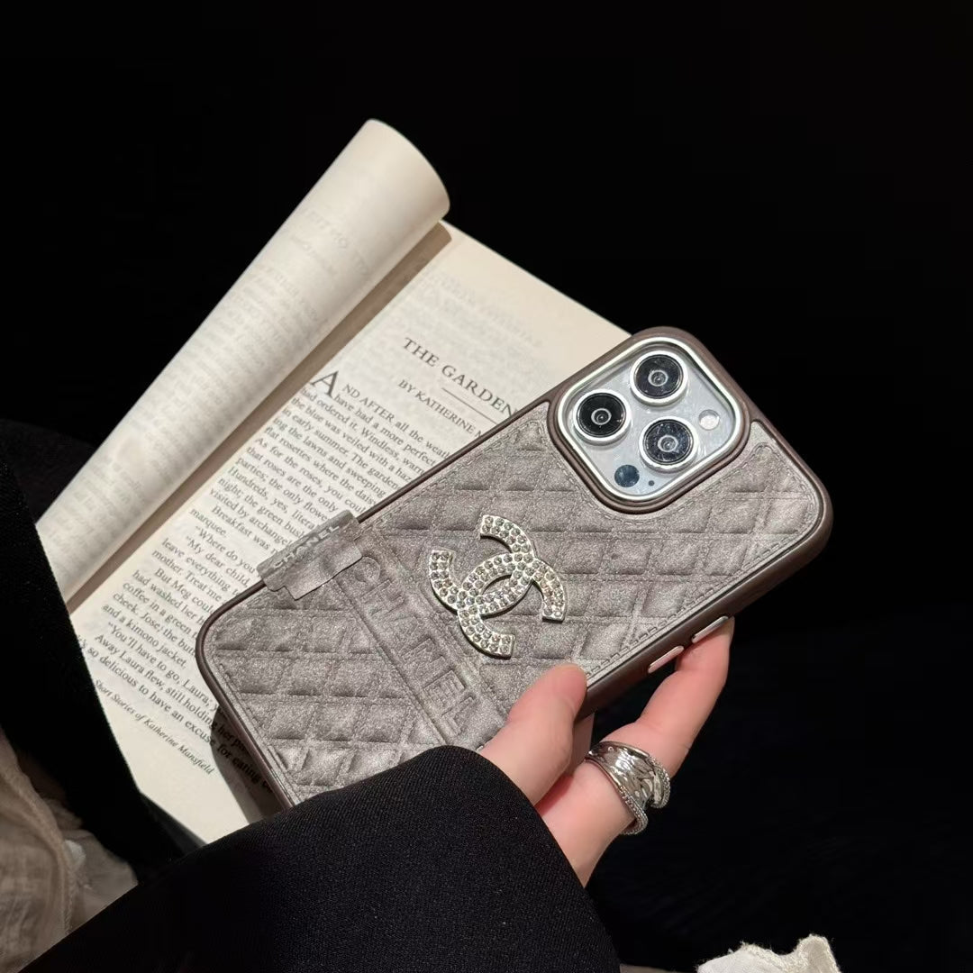 Chanel-inspired textured iPhone 16 Pro case with emblem