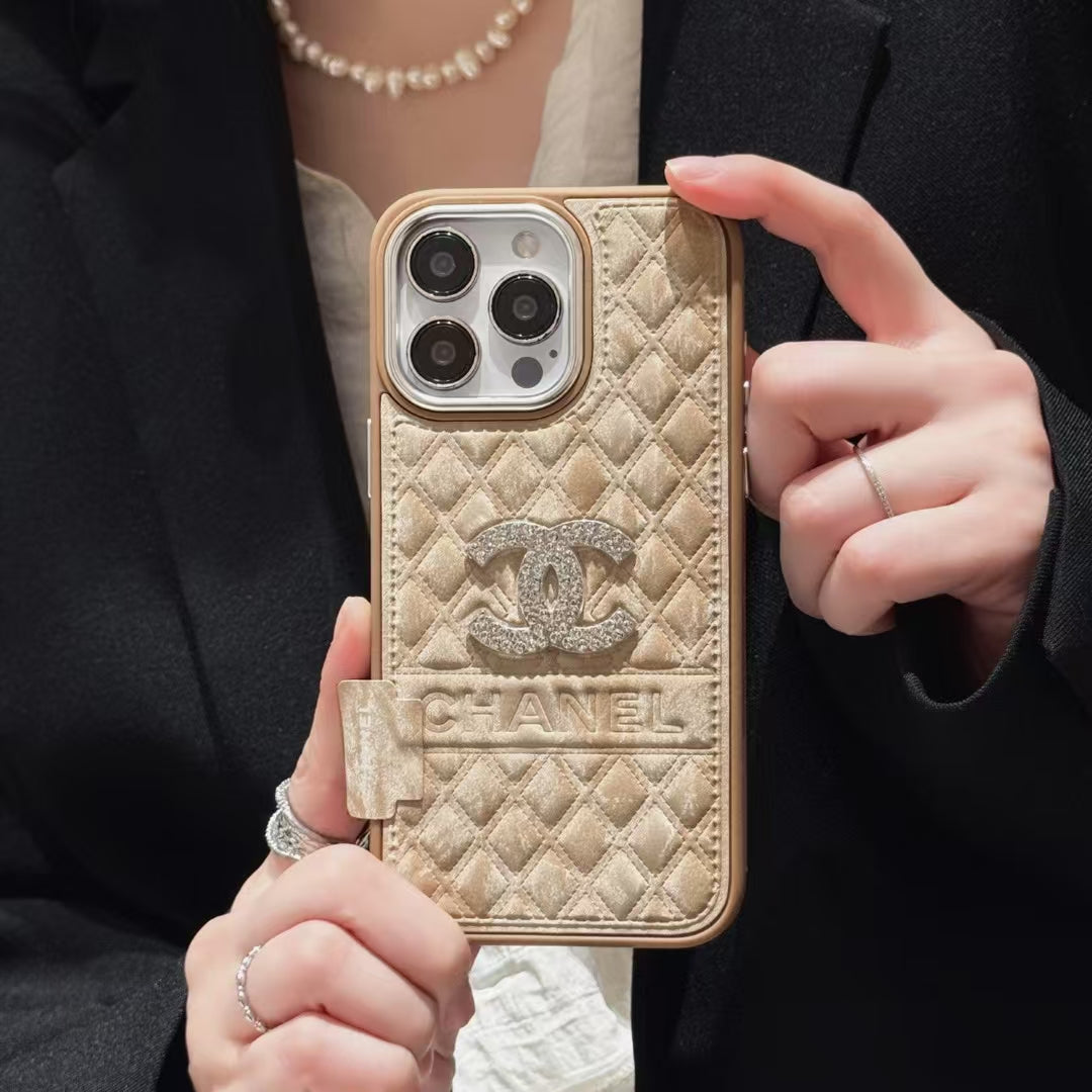 Chanel-inspired textured iPhone 16 Pro case with emblem