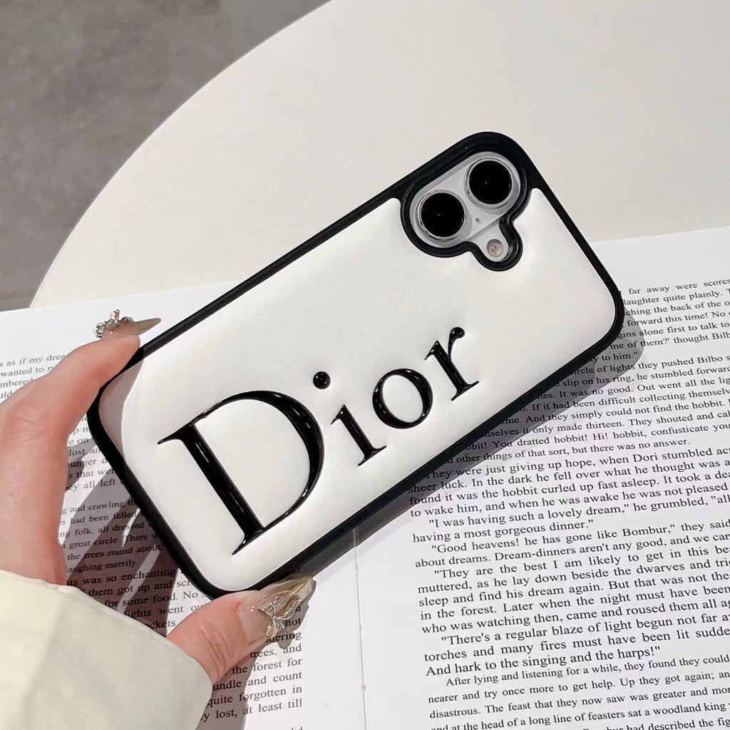 Dior-inspired black and white iPhone 16 Pro case with raised lettering