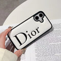 Dior-inspired black and white iPhone 16 Pro case with raised lettering