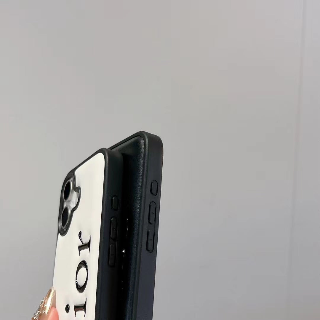 Dior-inspired black and white iPhone 16 Pro case with raised lettering