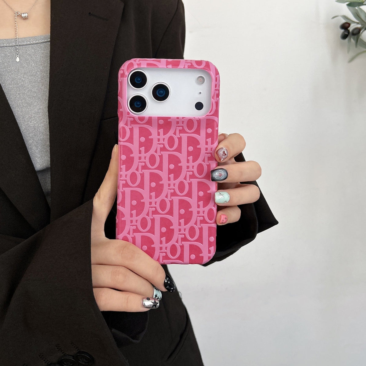 Dior-inspired bright all-over pattern case for iPhone 17 Pro Max