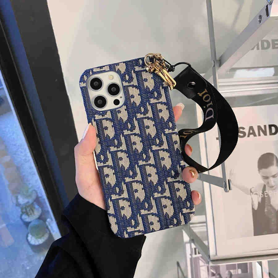 Dior-inspired all-over pattern phone case with hand strap