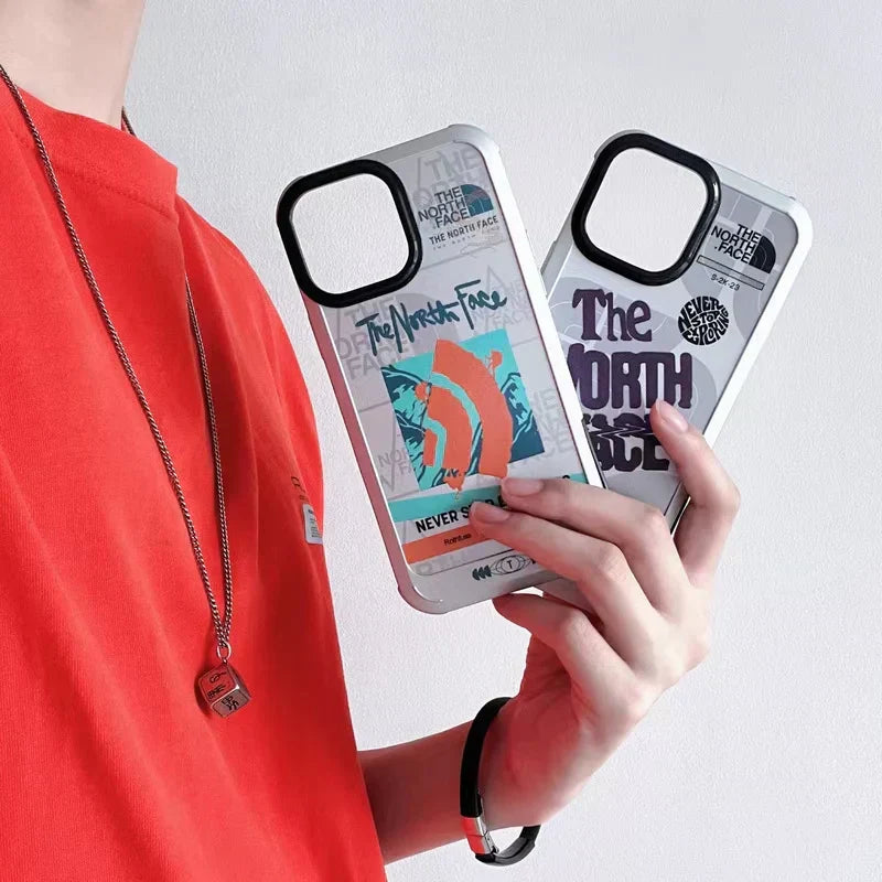 The North Face-inspired graphic print iPhone case with contrast camera frame