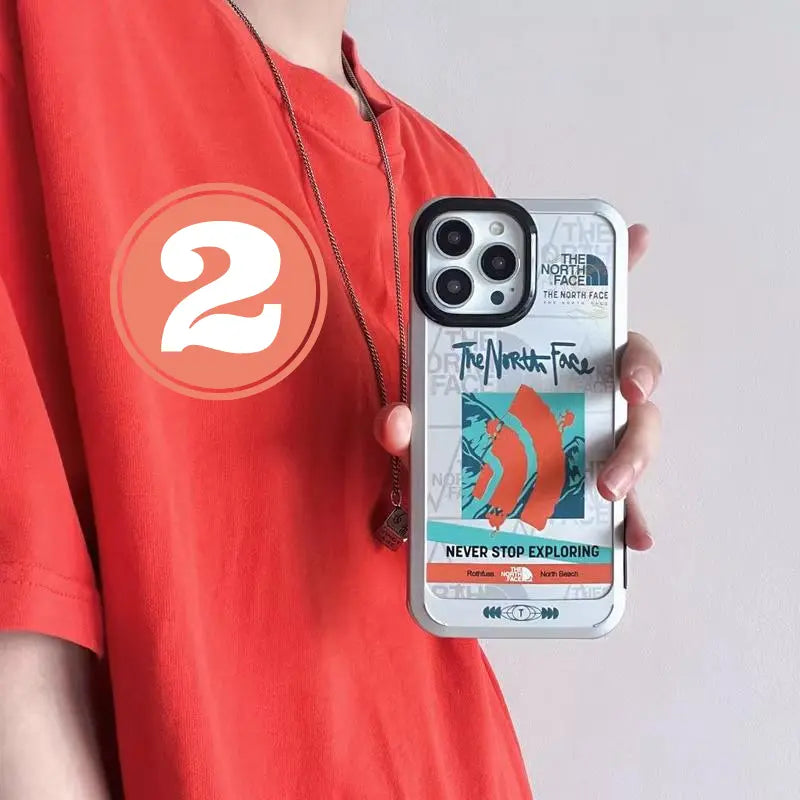 The North Face-inspired graphic print iPhone case with contrast camera frame