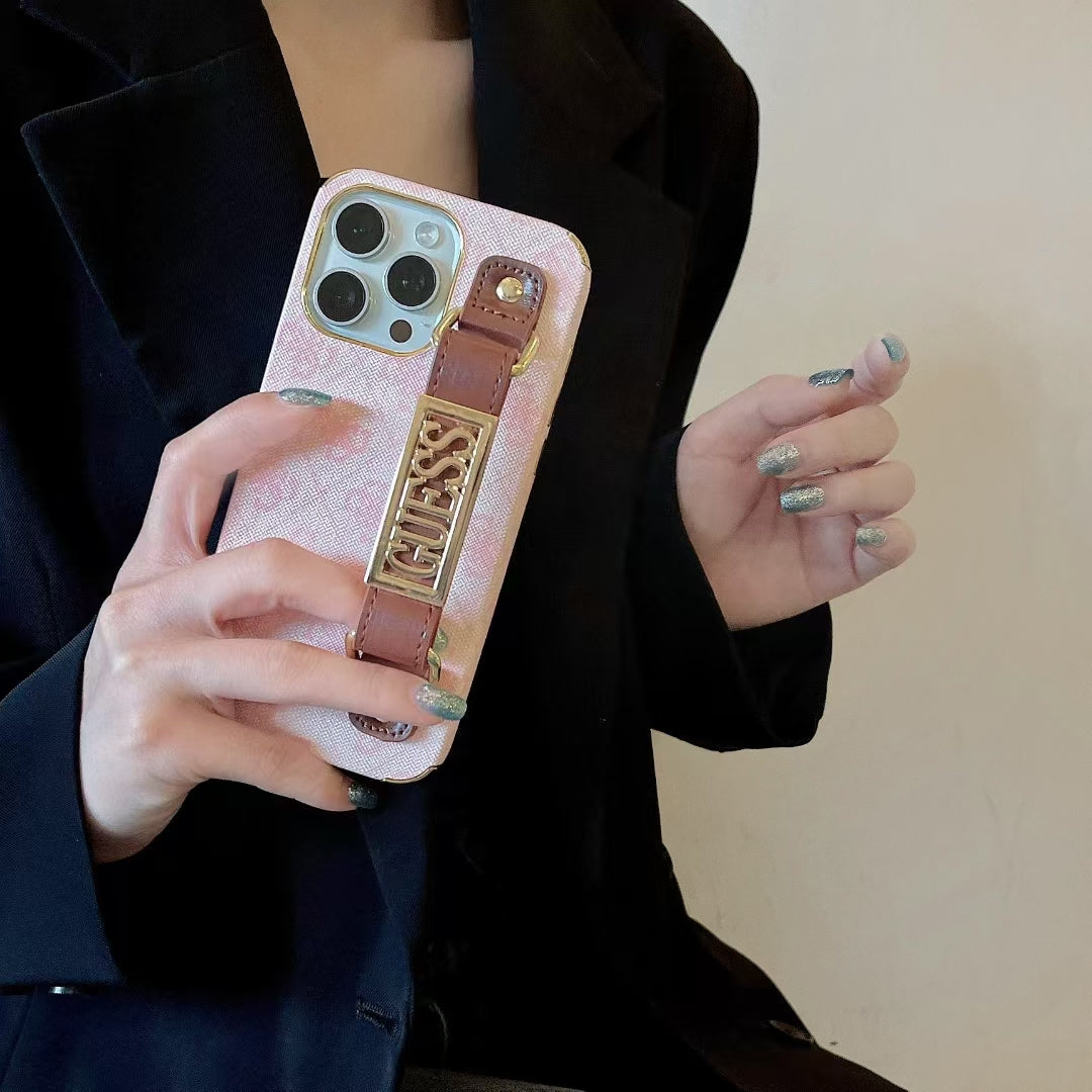 Guess-inspired iridescent iPhone 16 Pro Max case with hand strap