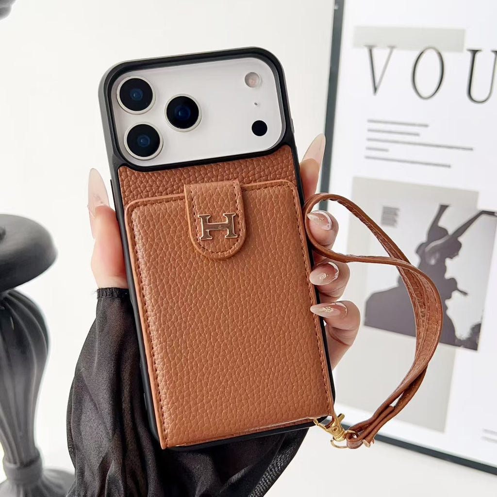 Hermes-inspired solid color iPhone 17 case with card holder and strap