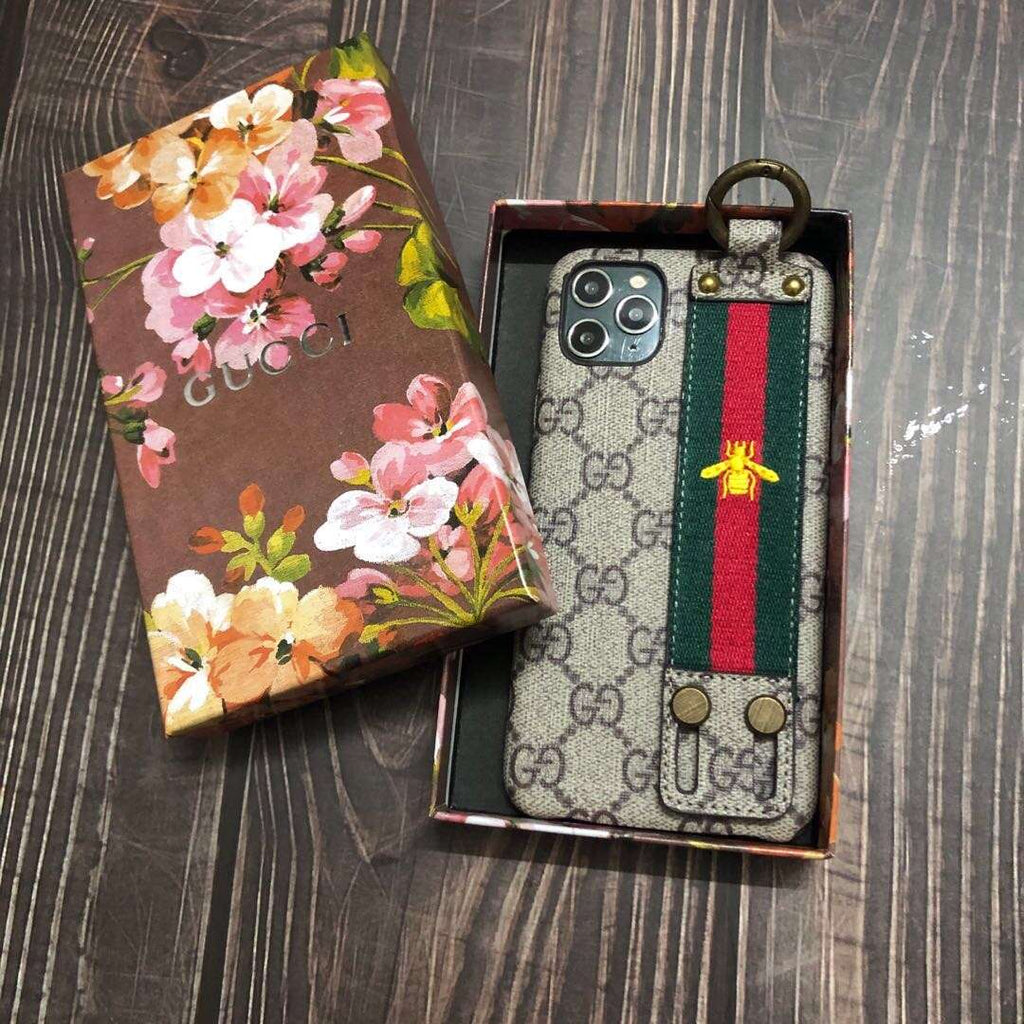 Gucci-inspired monogram iPhone case with striped hand strap