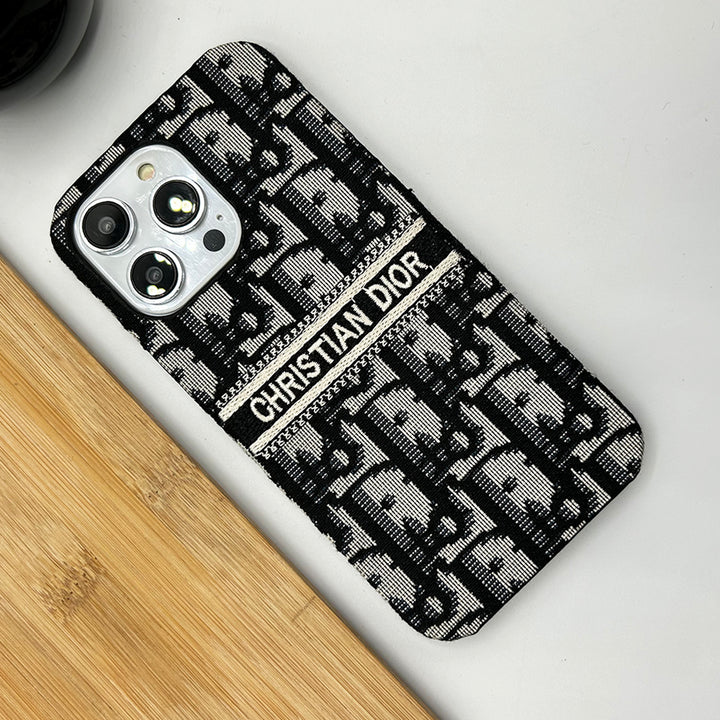Dior-inspired patterned iPhone case with contrast lettering band