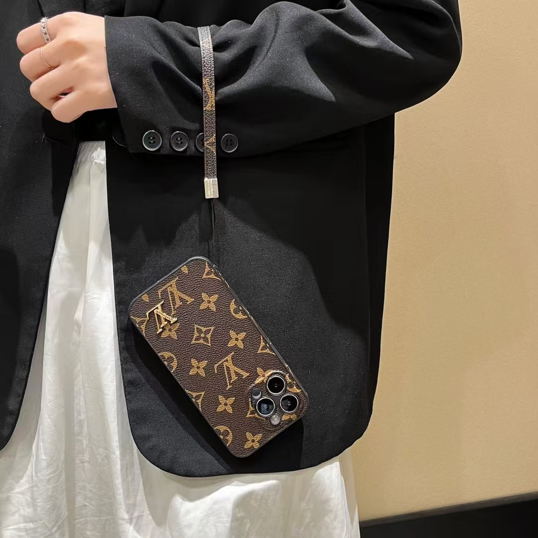 Louis Vuitton-inspired monogram iPhone 16 Pro case with matching strap
