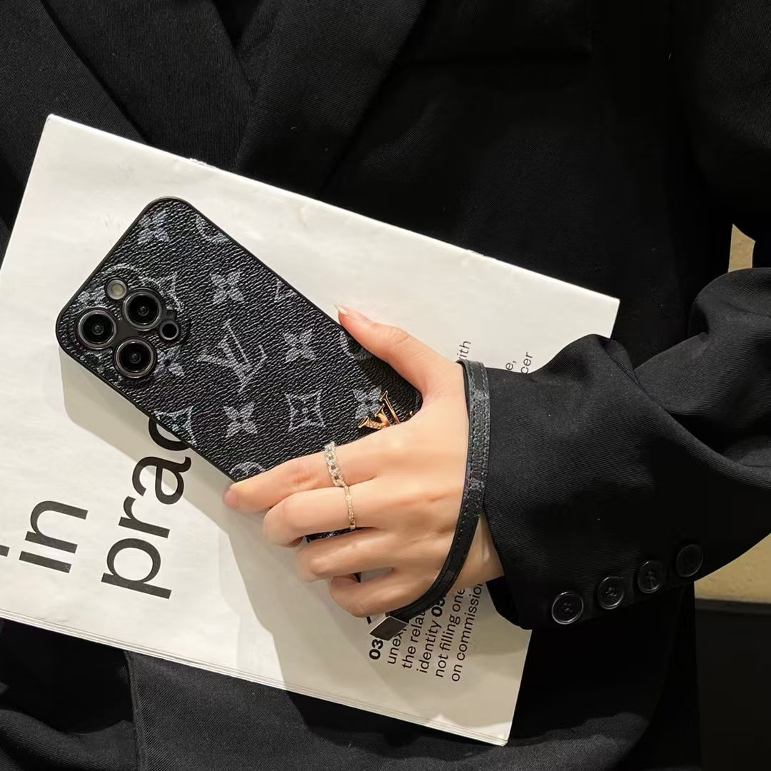 Louis Vuitton-inspired monogram iPhone 16 Pro case with matching strap
