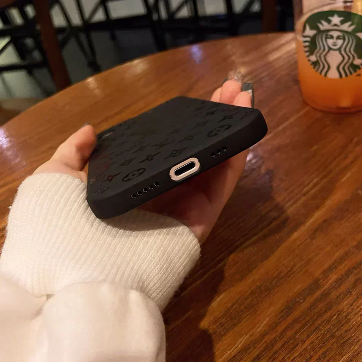 Louis Vuitton-inspired black embossed monogram iPhone 17 case