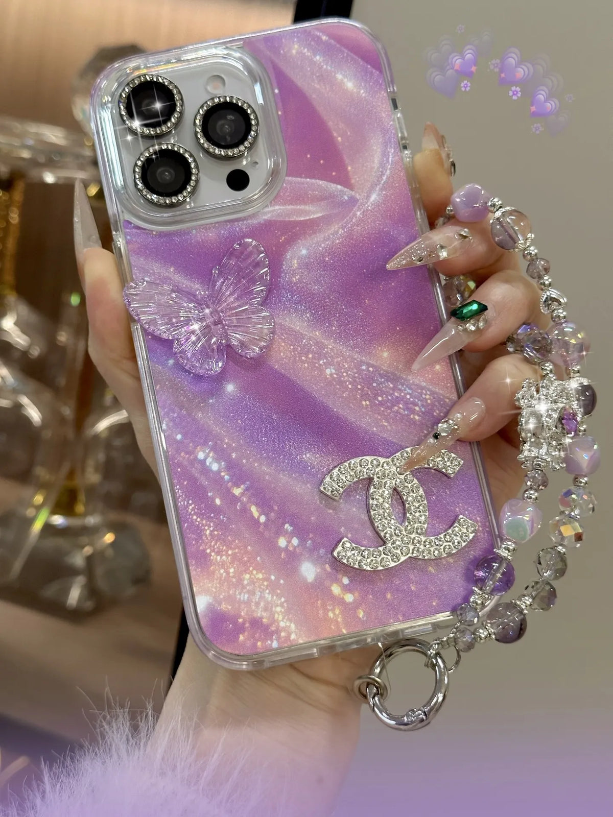 Louis Vuitton-inspired marbled phone case with chain charm