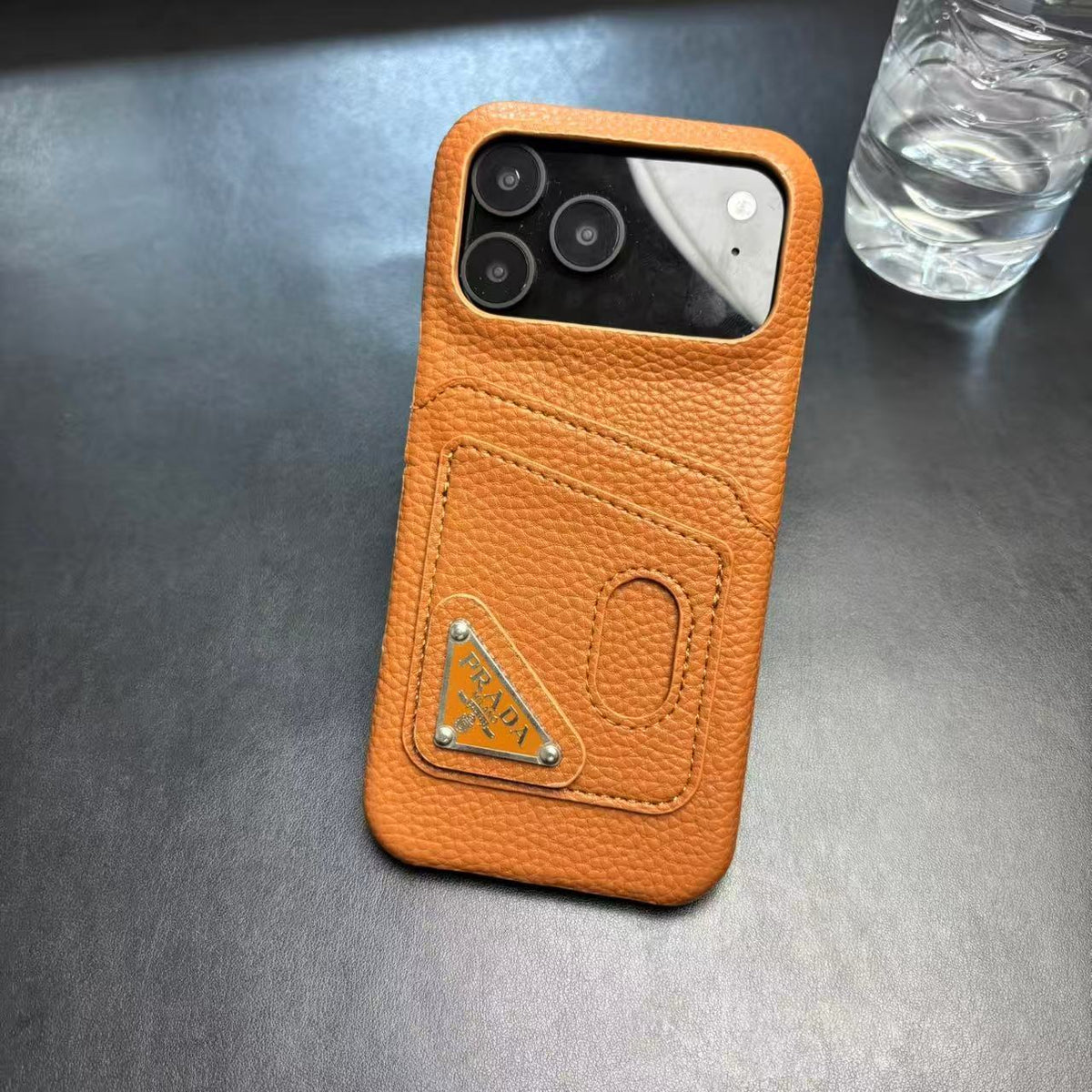 Prada-inspired pastel iPhone 17 Pro case with triangle detail