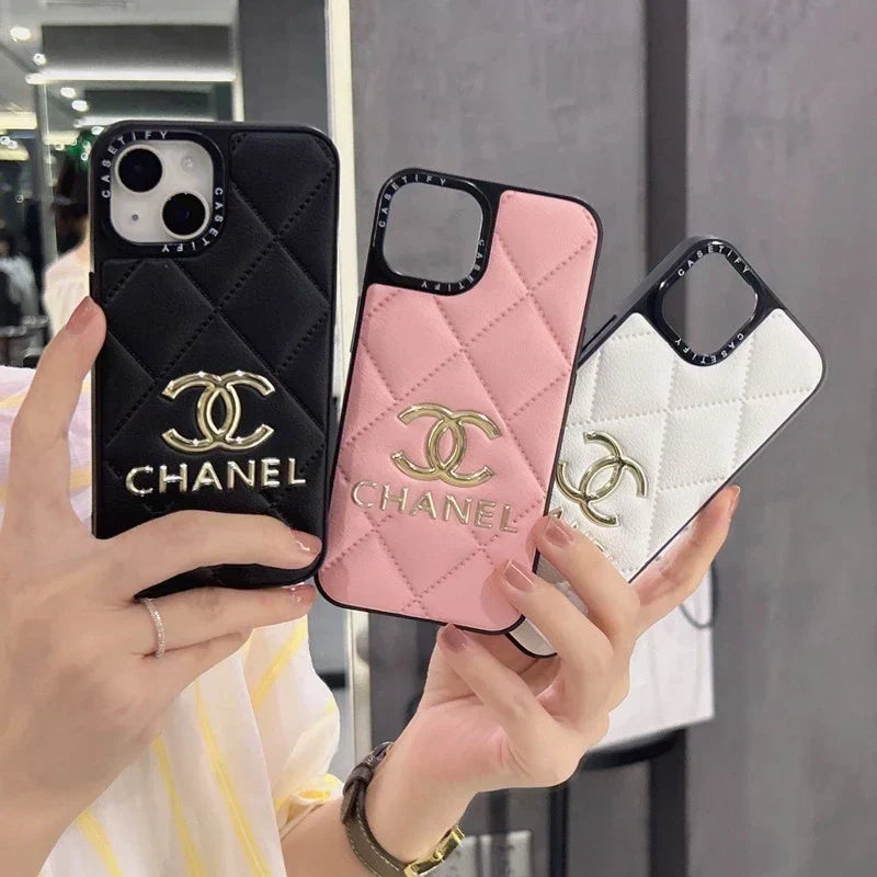 Chanel-inspired geometric iPhone case with metal emblem